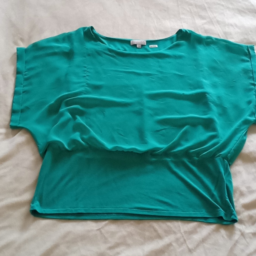 Turquoise summer shirt.